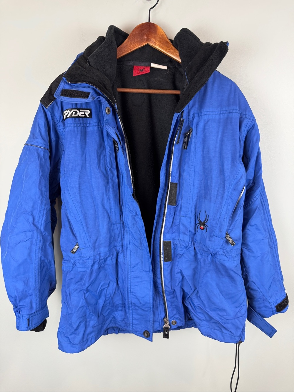 Women’s Spyder Electric Blue Puffer Ski Jacket with Black fleece Lining size 6